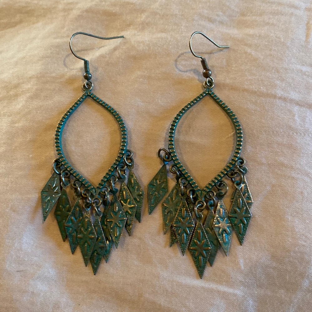 Dark antique green tribal style earrings.